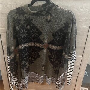 Women’s lightweight poncho style sweater.